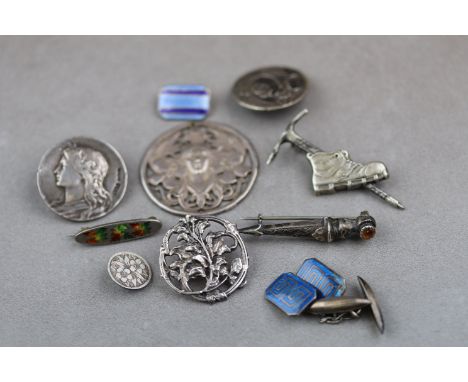 Silver buttons, brooches and pendants to include a circular Art Nouveau openwork pendant depicting female head with flowing h