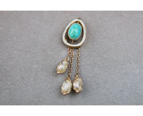 An early 20th century turquoise, baroque pearl and enamelled rose gold pendant, the central cabochon cut oval turquoise measu