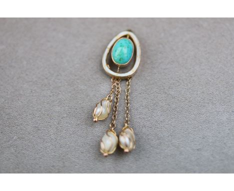 An early 20th century turquoise, baroque pearl and enamelled rose gold pendant, the central cabochon cut oval turquoise measu