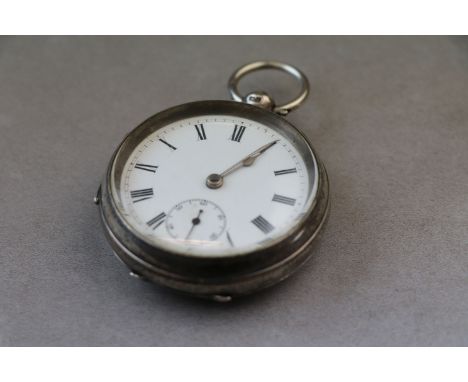 Late Victorian silver open face key wind pocket watch, white enamel dial and subsidiary seconds dial, black Roman numerals an