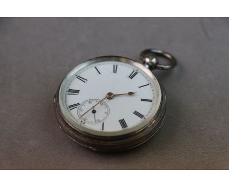 Victorian silver open face key wind pocket watch, white enamel dial and subsidiary seconds dial, black Roman numerals and min