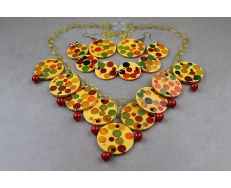 Vintage Bakelite jewellery suite, probably Charles Elkaim circa 1950s/ 1960s comprising Bakelite polka dot injection disc nec