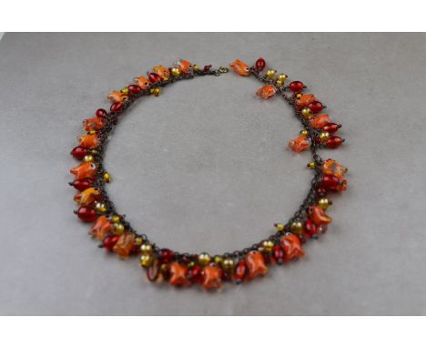 Vintage Murano glass fish necklace, striped orange glass goldfish beads suspended together with yellow and red glass beads fr