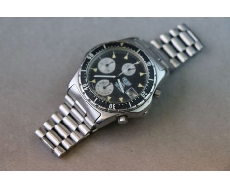 Stainless Steel Gents Heuer Quartz Chronograph 200M, black dial with three silvered sub-dials and date apeture, with rotating