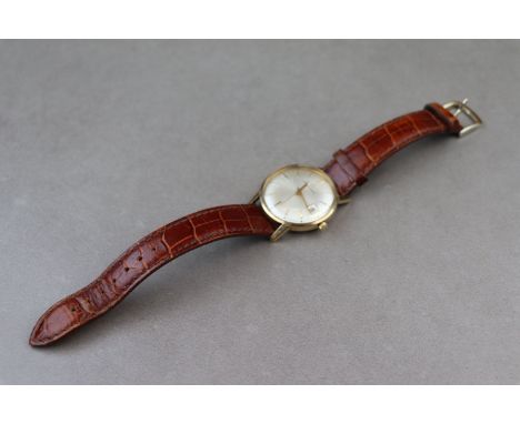 Gents 9ct Gold Eterna Matic wristwatch cal 103.550 and numbered beneath balance 1424UD, the silvered metallic dial is marked 