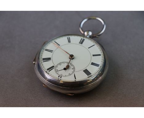 Late Victorian silver open face key wind pocket watch, cream enamel dial and subsidiary seconds dial (hairline cracks) black 