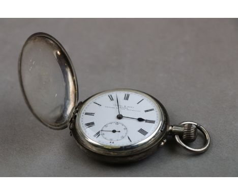 Early George V silver full hunter key wind pocket watch, white enamel dial and subsidiary seconds dial signed Kendal &amp; De