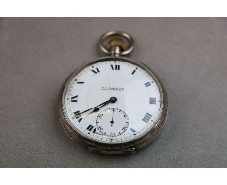 George V silver open face top wind pocket watch, white enamel dial and subsidiary seconds dial (hairline cracks) signed W.C M