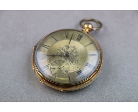 An 18ct yellow gold open faced pocket watch, engraved foliate design to dial, black Roman numerals, engine turned decoration 