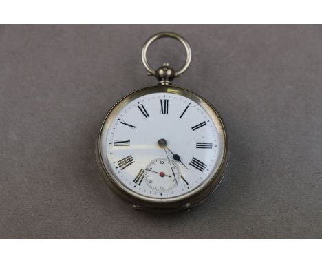 Continental silver open face key wind pocket watch, white enamel dial and subsidiary seconds dial, black Roman numerals and m