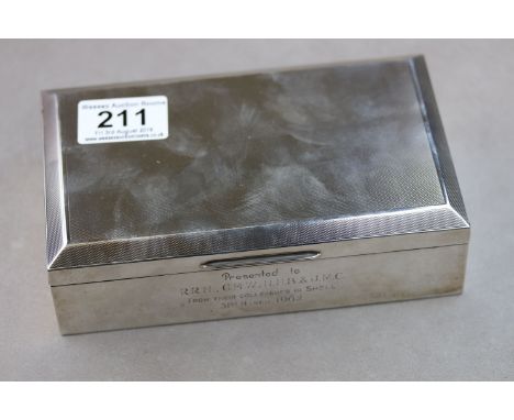 A silver cigar box, engine turned decoration to lid, presentation inscription, makers mark indistinct, Birmingham 1960, dimen