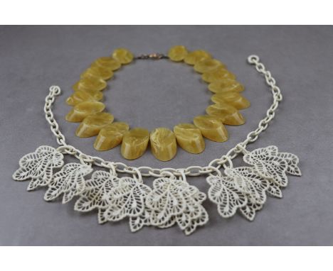 Vintage lace celluloid leaf necklace circa 1920s/ 1930s, white leaves suspended from white celluloid belcher link chain, leng