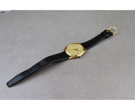 Gents Omega Seamaster Quartz wristwatch with gold plated bezel, stainless steel case back, gold dial with date box at the thr