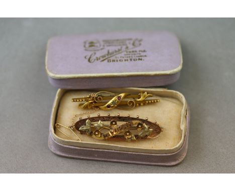 A Victorian diamond and ruby 15ct yellow gold double bar brooch, a small rose cut diamond and two small rose cut rubies set d