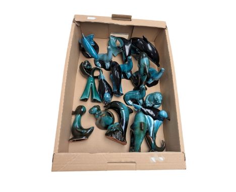 Canadian Blue Mountain Pottery and Poole Pottery figures, including dolphins, seals, vases, etc