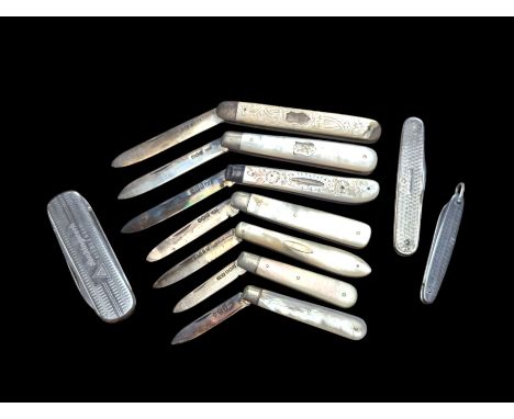 Seven mother of pearl handled silver fruit knives, all with folding silver blades, hallmarked together with three other foldi