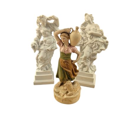 Three Royal Dux figures, comprising no.2262 shepherdess carrying water and two white bisque figures, tallest H26cm