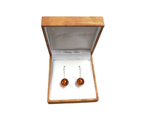 Pair of silver Baltic amber pendant earrings, boxed