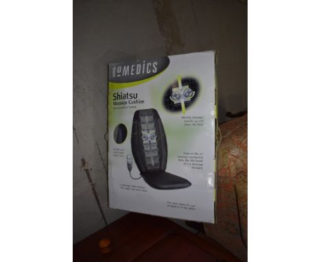 A Shiatsu electric massage cushion, boxed