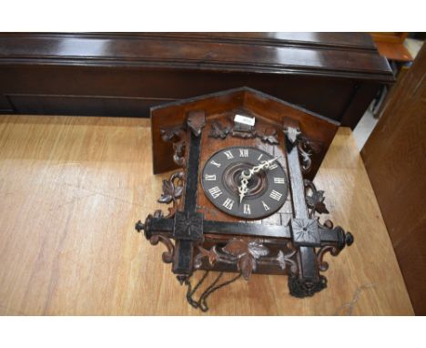 A traditional cuckoo clock, not tested but cuckoo mechanism appears to function, no penduleum or weight
