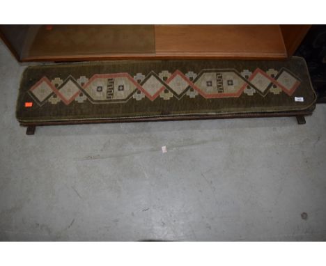 A late 19th or early 20th stained frame kneeling stool, with tapestry top, width approx. 122cm