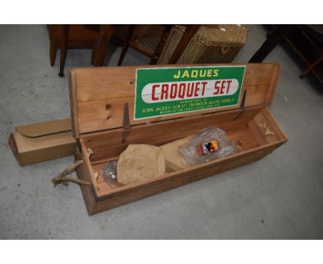 A vintage Croquet box (limited contents) and a projector screen