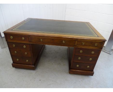 Georgian Partners Desk - a circa 1800 Mahogany pedestal desk with gold tooled single green leather insert comprising of 8( 2 