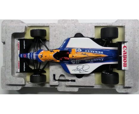 Nigel Mansell signed 1992 Williams Renault FW14b Formula one 1/18 scale Grand Prix classics die cast model. Good Condition. A