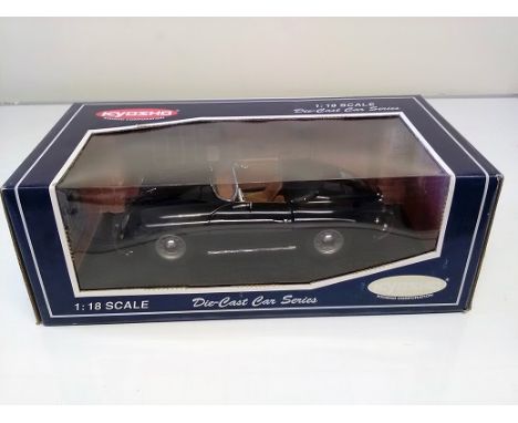 Porsche 356A Speedster Black Die cast 1:18 scale model car. Kyosho Die-Cast Car Series. In original box in good condition. Go