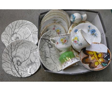 A Royal Doulton Bunnykins oval bowl, a Poole Pottery dish, Royal Albert tea cups and saucers, a Belleek jug and four owl deco