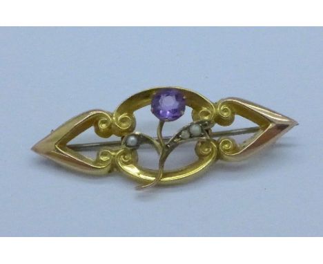 A 9ct gold, amethyst and seed pearl brooch, 1.6g