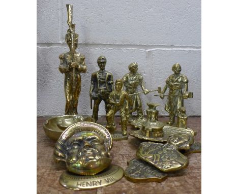 A collection of brassware, nine pieces in total, Henry VIII and Nelson door knockers, inkwell, coal miners, foundry workers, 