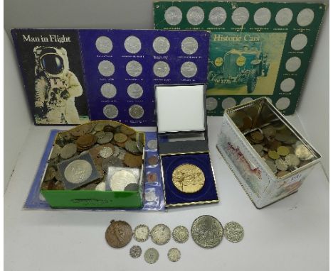 A collection of British coins and medallions plus a WWI Victory Medal to 56332 Pte. P. Smith, Notts & Derby. R.