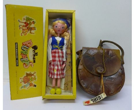 A Pelham puppet, Dutch Girl, boxed and a 1970's leather Chelsea Girl handbag
