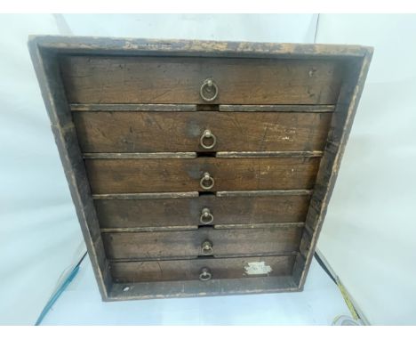 A VINTAGE SET OF OAK ENGINEERS DRAWERS 