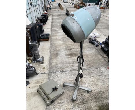 A HAIRDRESSERS DRYER AND A PANASONIC TYPEWRITER 
