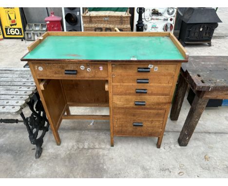 A VINTAGE WOODEN WORK STATION/DESK WITH SIX DRAWERS 