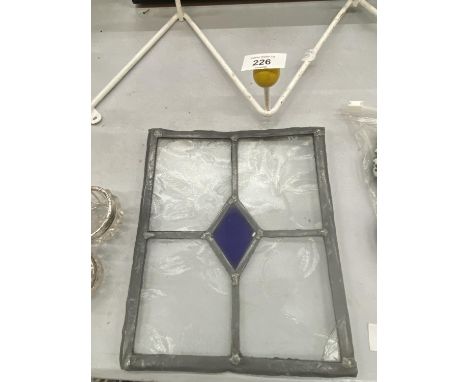 A SMALL VINTAGE STAINED GLASS WINDOW PANE 