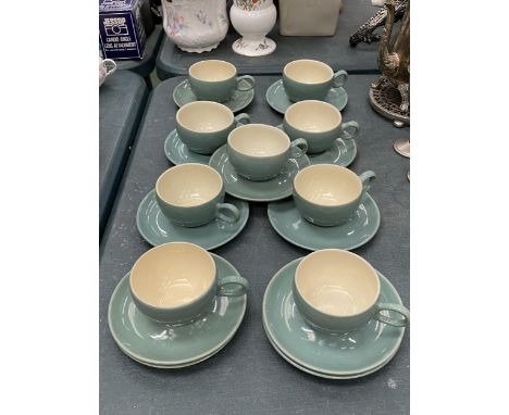 A QUANTITY OF DENBY CUPS AND SAUCERS IN GREEN 