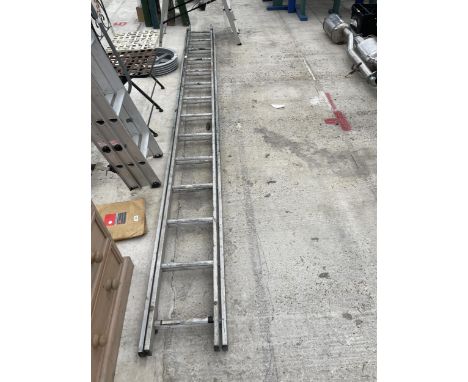 A TWENTY EIGHT RUNG TWO SECTION ALUMINIUM EXTENDING LADDER 