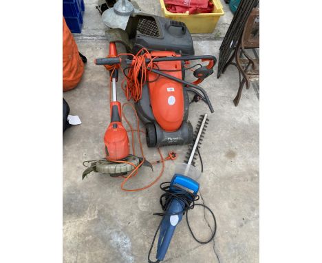AN ASSORTMENT OF GARDEN POWER TOOLS TO INCLUDE AN ELECTRIC FLYMO MOWER AND STRIMMER ETC 