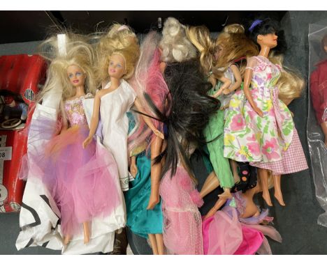 TWELVE VINTAGE DRESSED BARBIE DOLLS 