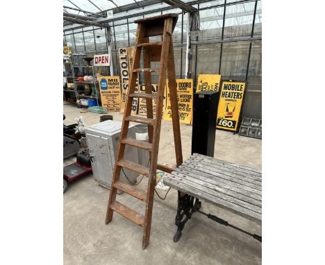 A VINTAGE EIGHT RUNG WOODEN STEP LADDER DATED 1960 AND BELIEVED TO BE FROM NORWEB 