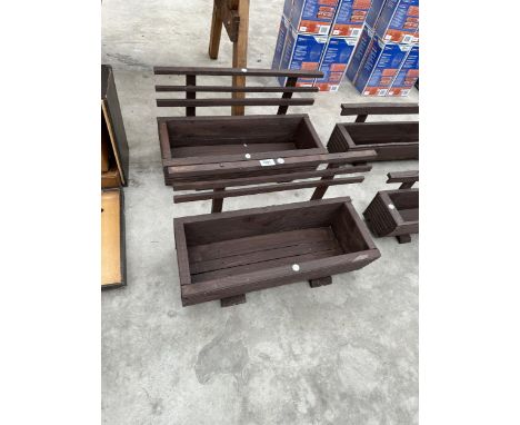 TWO WOODEN TROUGH PLANTERS WITH TRELIS BACKS 