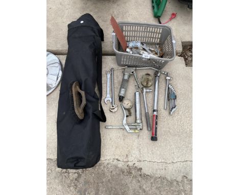 AN ASSORTMENT OF TOOLS TO INCLUDE GREASE GUNS, SPANNERS AND WRENCHES ETC 