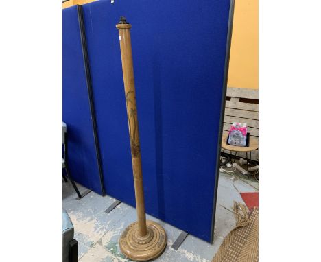 A CARVED WOODEN ORIENTAL STANDARD LAMP 