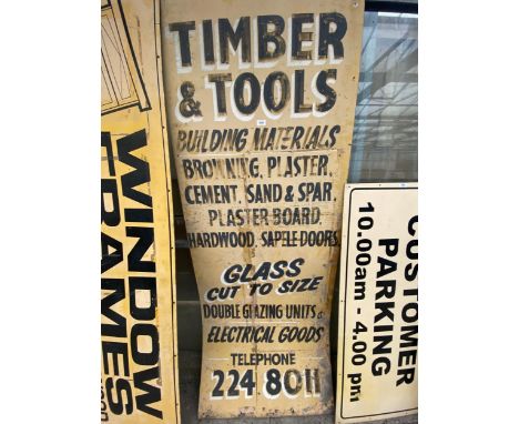A WOODEN 'TIMBER &amp; TOOLS' SIGN 