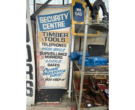 A WOODEN 'SECURITY CENTRE, TIMBER &amp; TOOLS' SIGN 