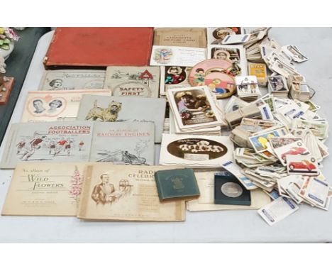 A COLLECTION OF VINTAGE CIGARETTE CARD ALBUMS TOGETHER WITH LOOSE EXAMPLES 