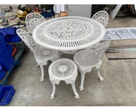 A VINTAGE STYLE CAST ALLOY PATIO SET COMPRISING OF A ROUND TABLE, FOUR CHAIRS AND A STOOL 